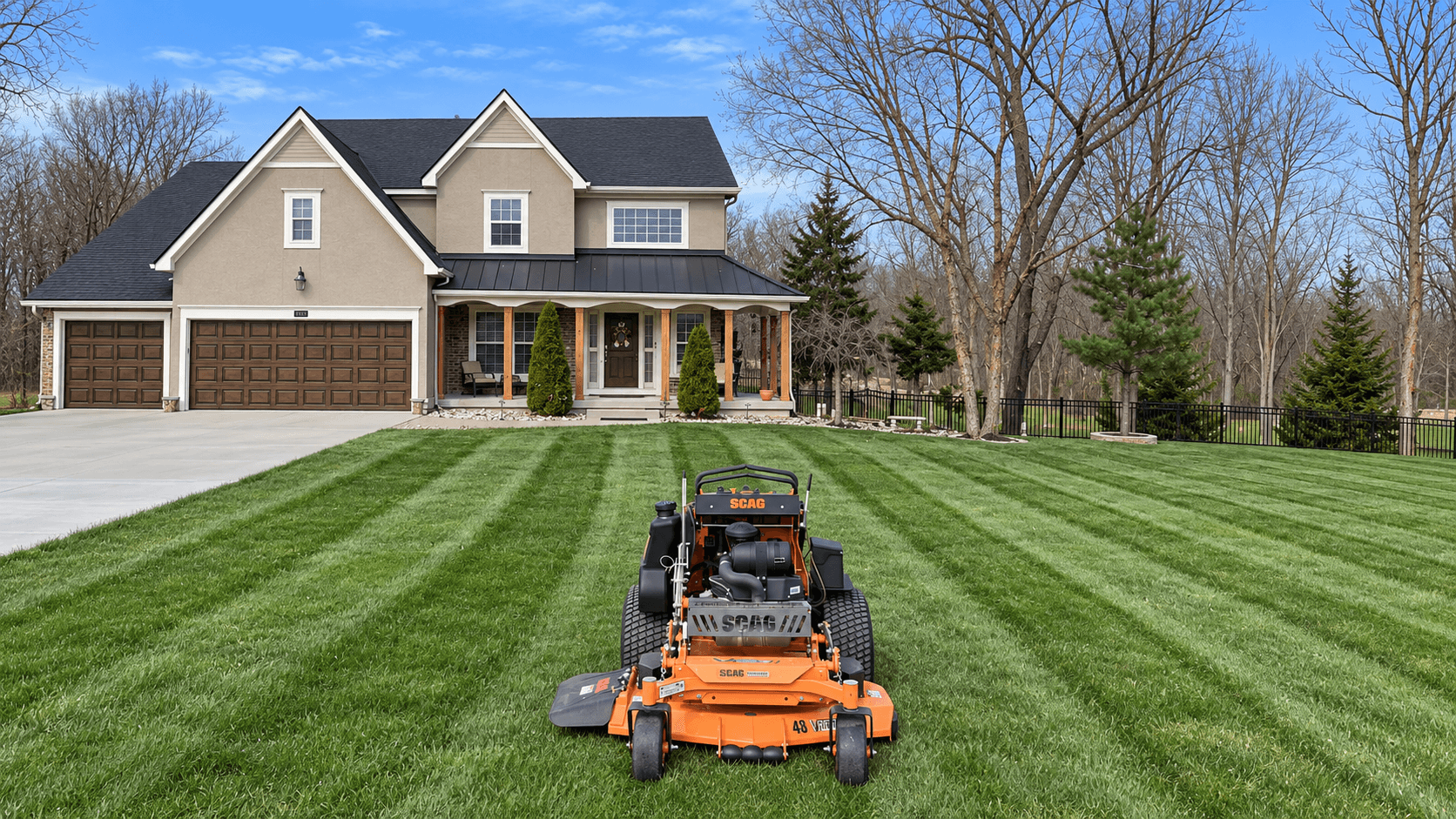 Lawn mower cutting a green lawn